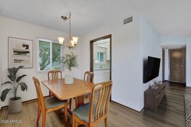 Beautifully updated patio-style townhouse offering modern on PalmBrook Country Club in Arizona - for sale on GolfHomes.com, golf home, golf lot