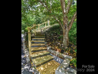 Distinctively Different. Unique contemporary home situated on on Kenmure Country Club in North Carolina - for sale on GolfHomes.com, golf home, golf lot