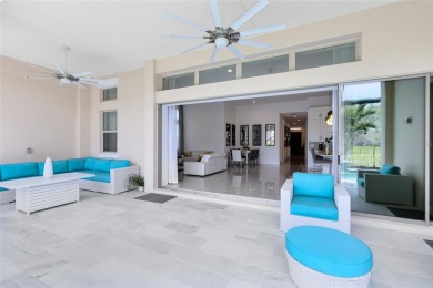 Welcome to an architectural gem in the esteemed Eagle Creek on Eagle Creek Golf Club in Florida - for sale on GolfHomes.com, golf home, golf lot