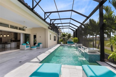 Welcome to an architectural gem in the esteemed Eagle Creek on Eagle Creek Golf Club in Florida - for sale on GolfHomes.com, golf home, golf lot
