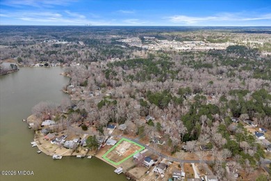 Beautiful prime lakefront property offering breathtaking on Golf Club of Macon in Georgia - for sale on GolfHomes.com, golf home, golf lot