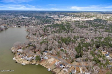 Beautiful prime lakefront property offering breathtaking on Golf Club of Macon in Georgia - for sale on GolfHomes.com, golf home, golf lot