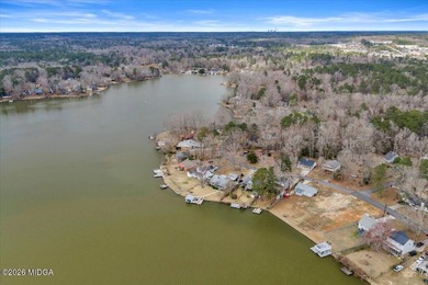 Beautiful prime lakefront property offering breathtaking on Golf Club of Macon in Georgia - for sale on GolfHomes.com, golf home, golf lot