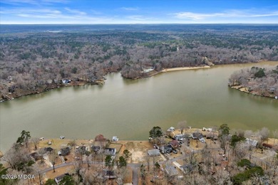 Beautiful prime lakefront property offering breathtaking on Golf Club of Macon in Georgia - for sale on GolfHomes.com, golf home, golf lot