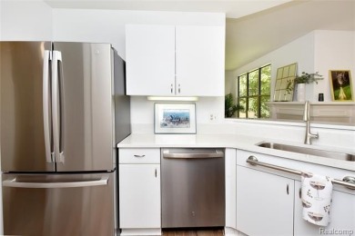 Discover the perfect blend of comfort and elegance in this on The Heathers Club in Michigan - for sale on GolfHomes.com, golf home, golf lot
