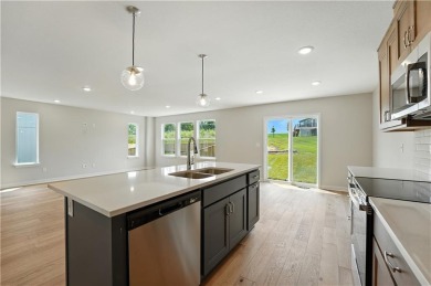 Welcome to this charming 4-bedroom, 3.5-bathroom two-story home on Golf Club of Creekmoor in Missouri - for sale on GolfHomes.com, golf home, golf lot