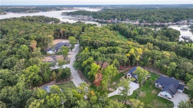 Stunning New Construction Reverse 1.5 Story Modern Farmhouse on The Club At Porto Cima in Missouri - for sale on GolfHomes.com, golf home, golf lot