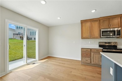 Welcome to this charming 4-bedroom, 3.5-bathroom two-story home on Golf Club of Creekmoor in Missouri - for sale on GolfHomes.com, golf home, golf lot