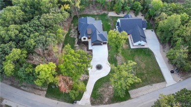 Stunning New Construction Reverse 1.5 Story Modern Farmhouse on The Club At Porto Cima in Missouri - for sale on GolfHomes.com, golf home, golf lot
