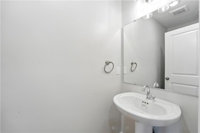 Welcome to this charming 4-bedroom, 3.5-bathroom two-story home on Golf Club of Creekmoor in Missouri - for sale on GolfHomes.com, golf home, golf lot