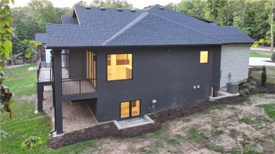Stunning New Construction Reverse 1.5 Story Modern Farmhouse on The Club At Porto Cima in Missouri - for sale on GolfHomes.com, golf home, golf lot