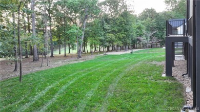 Stunning New Construction Reverse 1.5 Story Modern Farmhouse on The Club At Porto Cima in Missouri - for sale on GolfHomes.com, golf home, golf lot