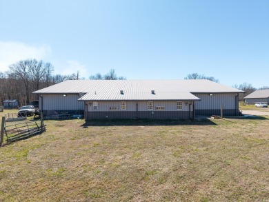 A RIVER RUNS THROUGH IT!!Located approx. 27 mi SE of Waldron on  in Arkansas - for sale on GolfHomes.com, golf home, golf lot