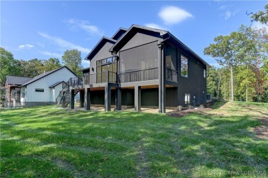 Stunning New Construction Reverse 1.5 Story Modern Farmhouse on The Club At Porto Cima in Missouri - for sale on GolfHomes.com, golf home, golf lot