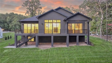 Stunning New Construction Reverse 1.5 Story Modern Farmhouse on The Club At Porto Cima in Missouri - for sale on GolfHomes.com, golf home, golf lot