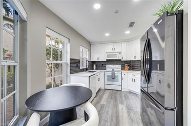 This beautifully renovated first-floor end unit at Worthington on  in Florida - for sale on GolfHomes.com, golf home, golf lot