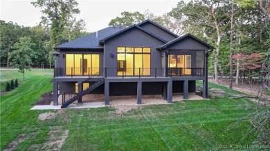 Stunning New Construction Reverse 1.5 Story Modern Farmhouse on The Club At Porto Cima in Missouri - for sale on GolfHomes.com, golf home, golf lot