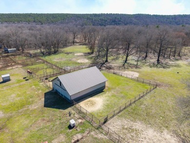 A RIVER RUNS THROUGH IT!!Located approx. 27 mi SE of Waldron on  in Arkansas - for sale on GolfHomes.com, golf home, golf lot