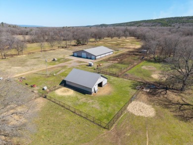 A RIVER RUNS THROUGH IT!!Located approx. 27 mi SE of Waldron on  in Arkansas - for sale on GolfHomes.com, golf home, golf lot