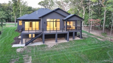 Stunning New Construction Reverse 1.5 Story Modern Farmhouse on The Club At Porto Cima in Missouri - for sale on GolfHomes.com, golf home, golf lot