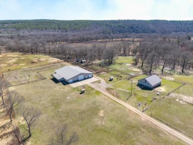 A RIVER RUNS THROUGH IT!!Located approx. 27 mi SE of Waldron on  in Arkansas - for sale on GolfHomes.com, golf home, golf lot
