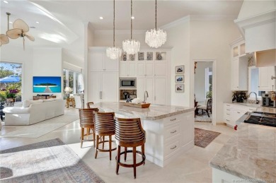 Experience the luxury and elegance of this Sailfish Point estate on Sailfish Point Golf Club, Inc. in Florida - for sale on GolfHomes.com, golf home, golf lot