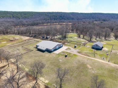 A RIVER RUNS THROUGH IT!!Located approx. 27 mi SE of Waldron on  in Arkansas - for sale on GolfHomes.com, golf home, golf lot