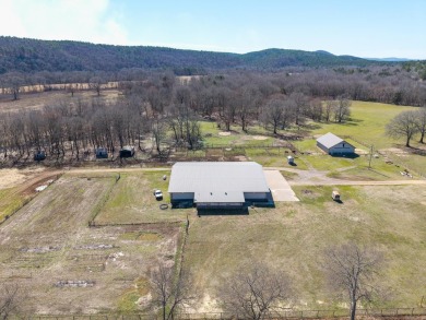 A RIVER RUNS THROUGH IT!!Located approx. 27 mi SE of Waldron on  in Arkansas - for sale on GolfHomes.com, golf home, golf lot