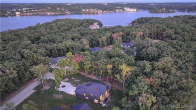 Stunning New Construction Reverse 1.5 Story Modern Farmhouse on The Club At Porto Cima in Missouri - for sale on GolfHomes.com, golf home, golf lot