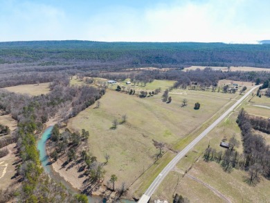 A RIVER RUNS THROUGH IT!!Located approx. 27 mi SE of Waldron on  in Arkansas - for sale on GolfHomes.com, golf home, golf lot