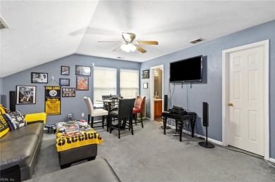 Well maintained and updated brick ranch situated across from on Nansemond River Golf Club in Virginia - for sale on GolfHomes.com, golf home, golf lot