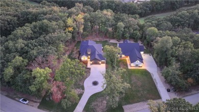 Stunning New Construction Reverse 1.5 Story Modern Farmhouse on The Club At Porto Cima in Missouri - for sale on GolfHomes.com, golf home, golf lot