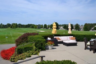 Discover the perfect blend of comfort and elegance in this on The Heathers Club in Michigan - for sale on GolfHomes.com, golf home, golf lot
