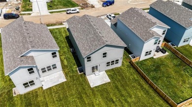 Welcome to this charming 4-bedroom, 3.5-bathroom two-story home on Golf Club of Creekmoor in Missouri - for sale on GolfHomes.com, golf home, golf lot