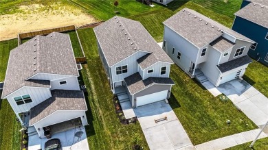 Welcome to this charming 4-bedroom, 3.5-bathroom two-story home on Golf Club of Creekmoor in Missouri - for sale on GolfHomes.com, golf home, golf lot