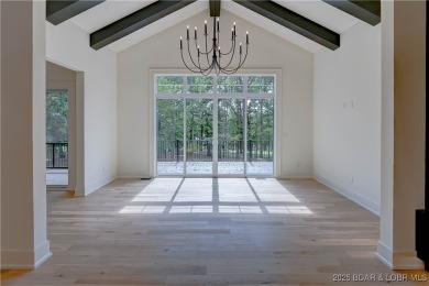 Stunning New Construction Reverse 1.5 Story Modern Farmhouse on The Club At Porto Cima in Missouri - for sale on GolfHomes.com, golf home, golf lot