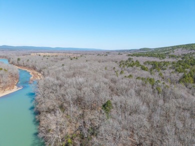 A RIVER RUNS THROUGH IT!!Located approx. 27 mi SE of Waldron on  in Arkansas - for sale on GolfHomes.com, golf home, golf lot