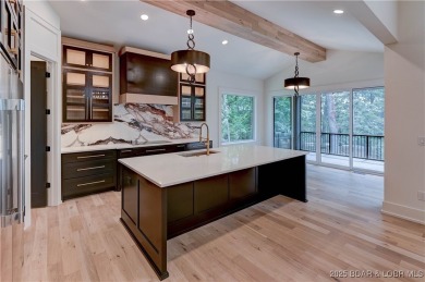 Stunning New Construction Reverse 1.5 Story Modern Farmhouse on The Club At Porto Cima in Missouri - for sale on GolfHomes.com, golf home, golf lot