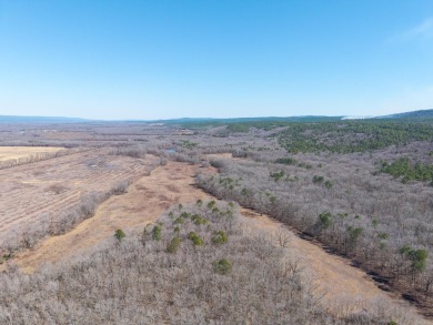 A RIVER RUNS THROUGH IT!!Located approx. 27 mi SE of Waldron on  in Arkansas - for sale on GolfHomes.com, golf home, golf lot