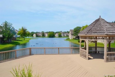 Discover the perfect blend of comfort and elegance in this on The Heathers Club in Michigan - for sale on GolfHomes.com, golf home, golf lot