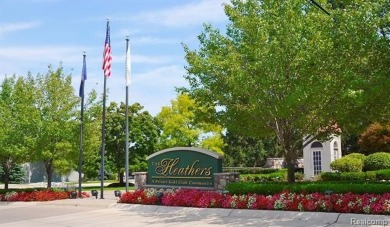 Discover the perfect blend of comfort and elegance in this on The Heathers Club in Michigan - for sale on GolfHomes.com, golf home, golf lot