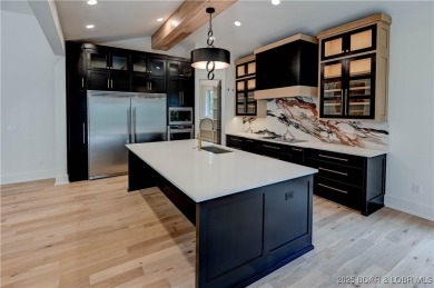 Stunning New Construction Reverse 1.5 Story Modern Farmhouse on The Club At Porto Cima in Missouri - for sale on GolfHomes.com, golf home, golf lot