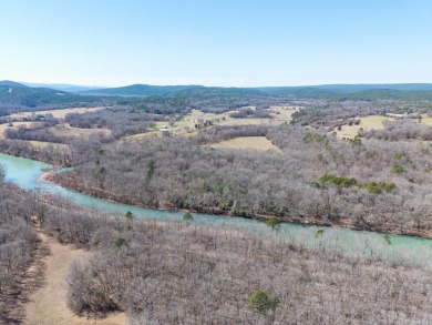 A RIVER RUNS THROUGH IT!!Located approx. 27 mi SE of Waldron on  in Arkansas - for sale on GolfHomes.com, golf home, golf lot