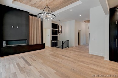 Stunning New Construction Reverse 1.5 Story Modern Farmhouse on The Club At Porto Cima in Missouri - for sale on GolfHomes.com, golf home, golf lot