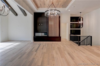 Stunning New Construction Reverse 1.5 Story Modern Farmhouse on The Club At Porto Cima in Missouri - for sale on GolfHomes.com, golf home, golf lot