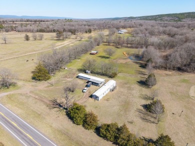 A RIVER RUNS THROUGH IT!!Located approx. 27 mi SE of Waldron on  in Arkansas - for sale on GolfHomes.com, golf home, golf lot