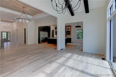 Stunning New Construction Reverse 1.5 Story Modern Farmhouse on The Club At Porto Cima in Missouri - for sale on GolfHomes.com, golf home, golf lot