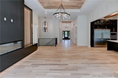 Stunning New Construction Reverse 1.5 Story Modern Farmhouse on The Club At Porto Cima in Missouri - for sale on GolfHomes.com, golf home, golf lot