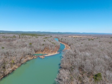 A RIVER RUNS THROUGH IT!!Located approx. 27 mi SE of Waldron on  in Arkansas - for sale on GolfHomes.com, golf home, golf lot