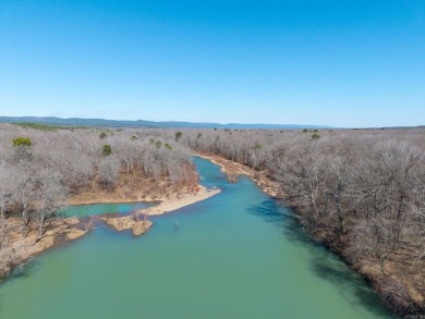 A RIVER RUNS THROUGH IT!!Located approx. 27 mi SE of Waldron on  in Arkansas - for sale on GolfHomes.com, golf home, golf lot